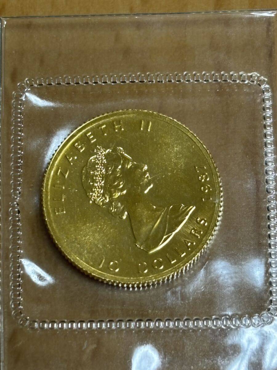 K24 純金 メイプルリーフ金貨 1/4オンス_画像1