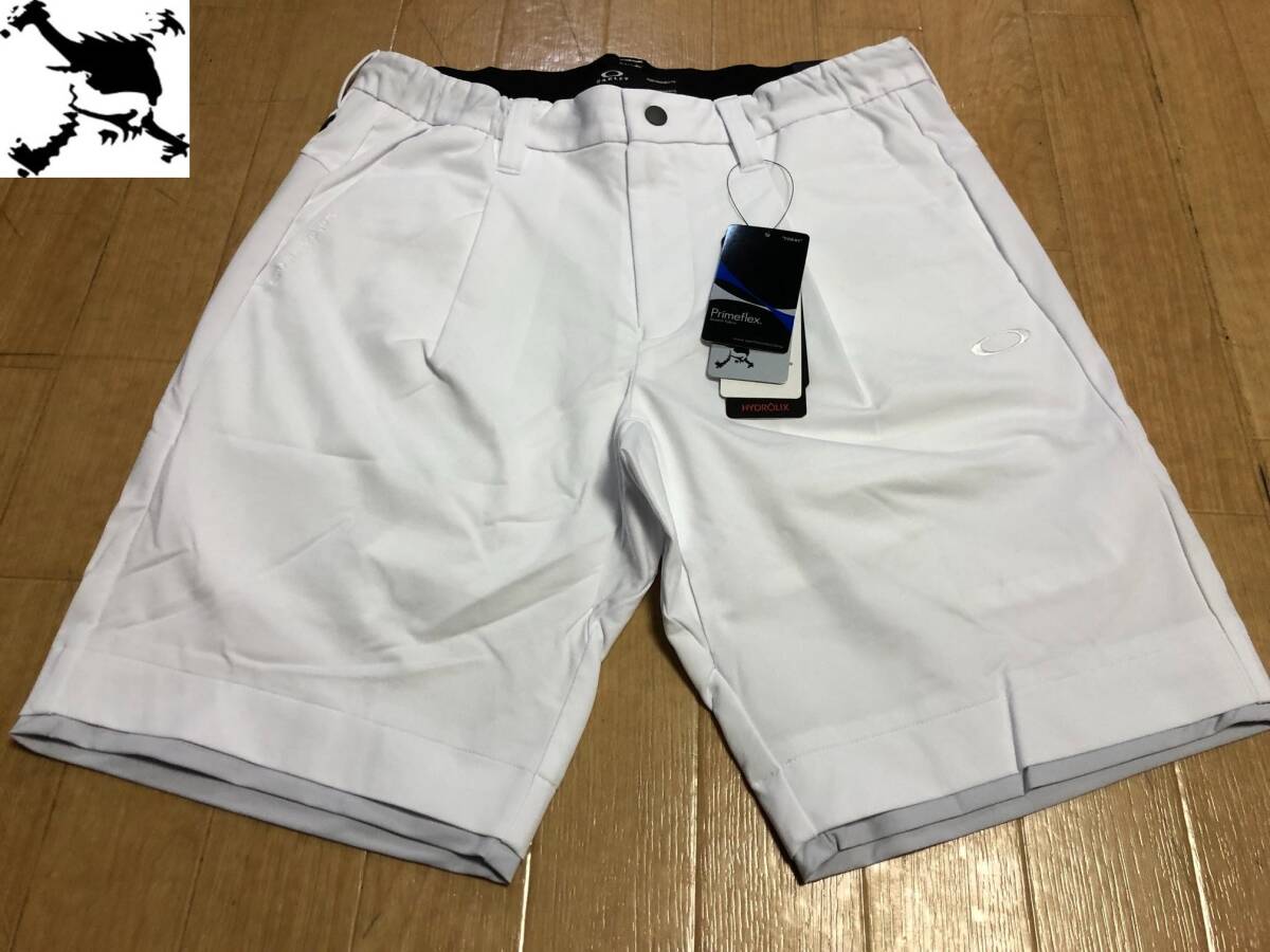 OAKLEY(オークリー) 春夏 SKULL COMMON SHORTS 1.0 吸汗速乾、4WAYストレッチ、UPF50+ ハーフパンツ FOA403528(WHITE)８５－９０の画像1