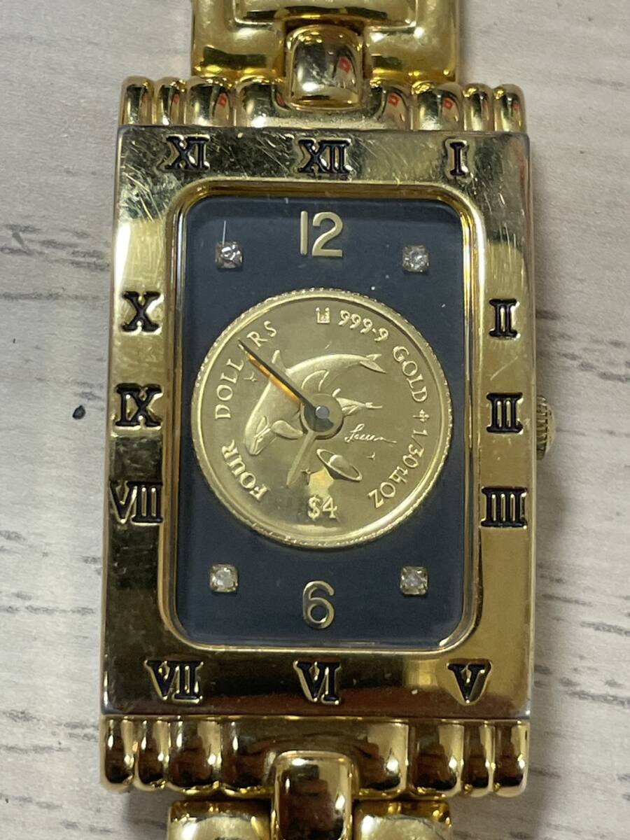1円スタート　クリスチャン ラッセン 腕時計 レディース 1/30oz ゴールドコイン イルカ クォーツ　現状品