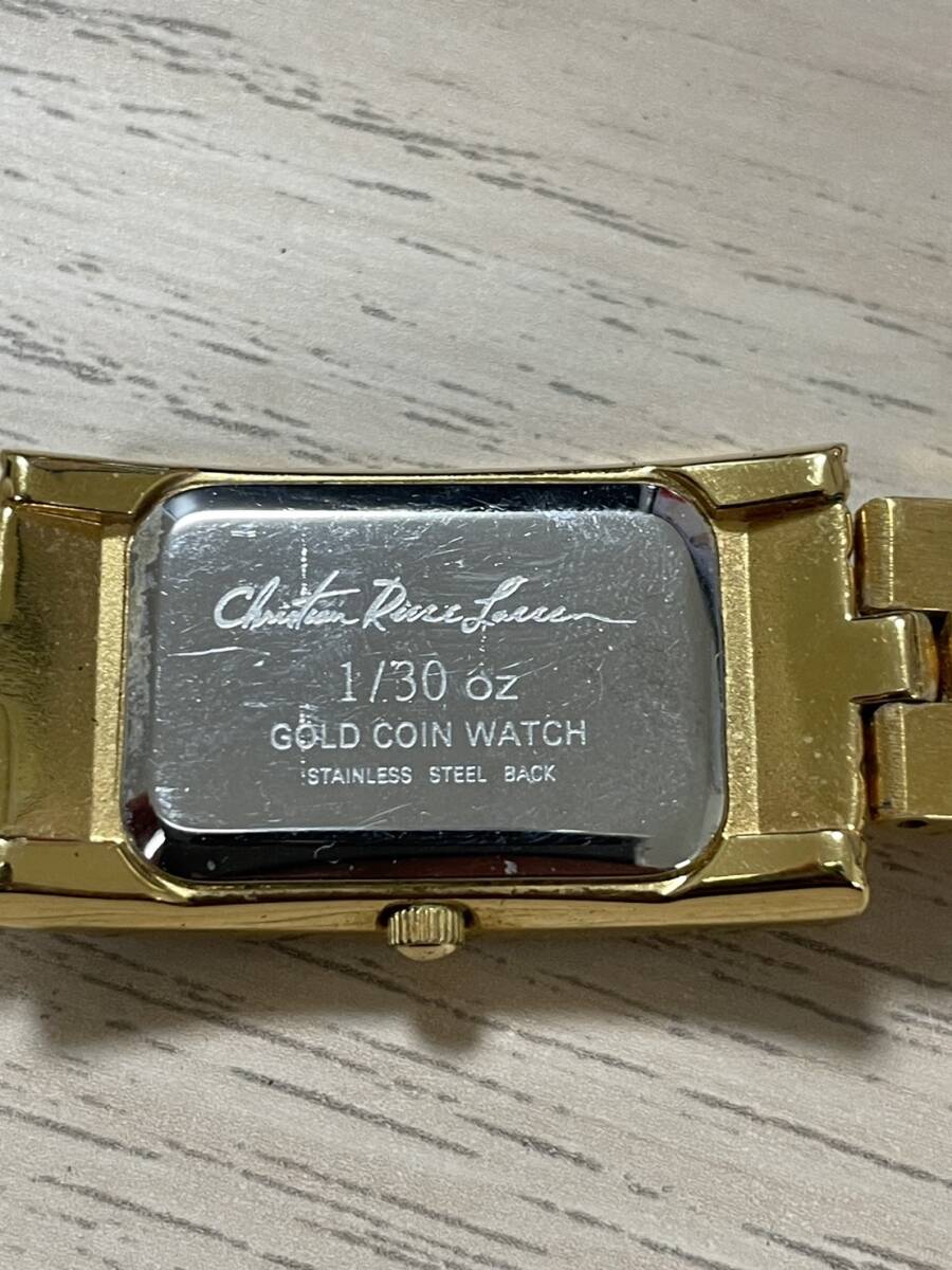 1円スタート　クリスチャン ラッセン 腕時計 レディース 1/30oz ゴールドコイン イルカ クォーツ　現状品
