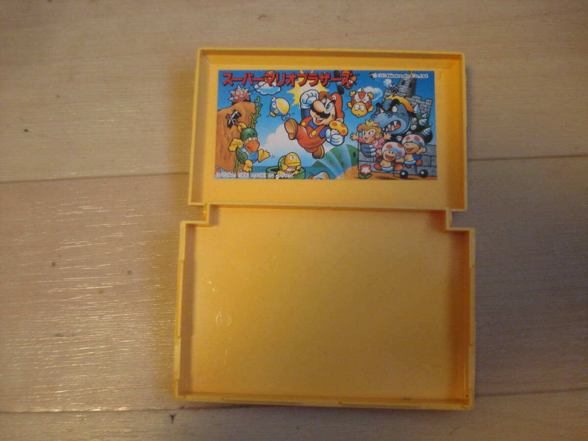 W* Bandai кассета название место поверхность игра Super Mario Brothers подлинная вещь кейс * стоимость доставки 120 иен 