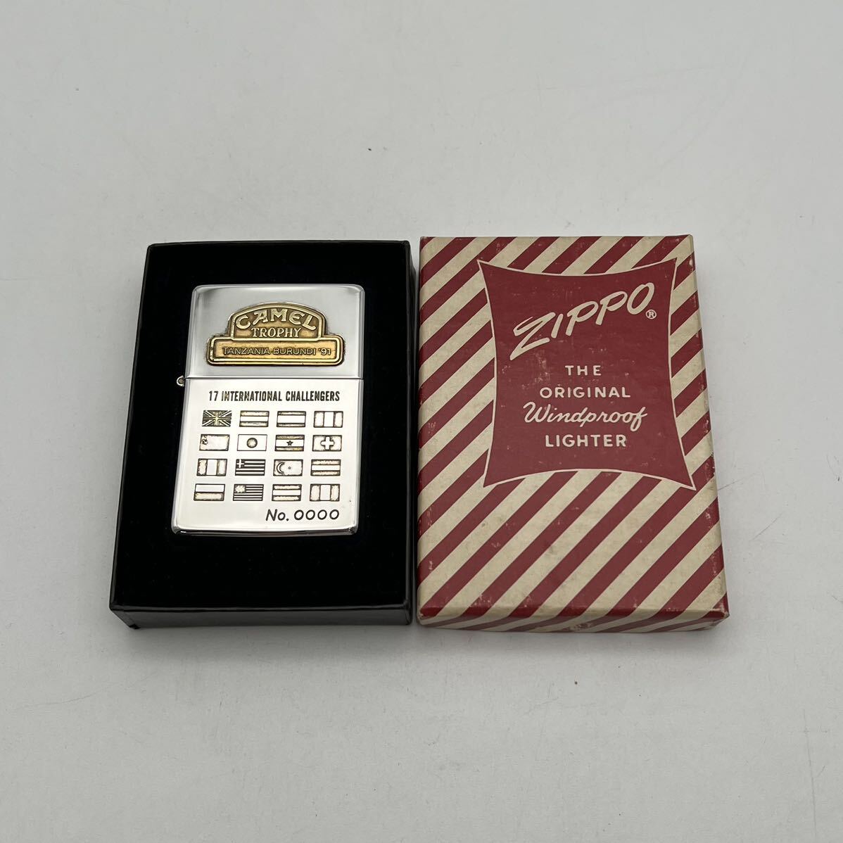 ZIPPO ジッポ オイルライター CAMEL TROPHY TANZANIA・BURUNDI'91 No.0000 国旗デザイン 箱付 現状品の画像1