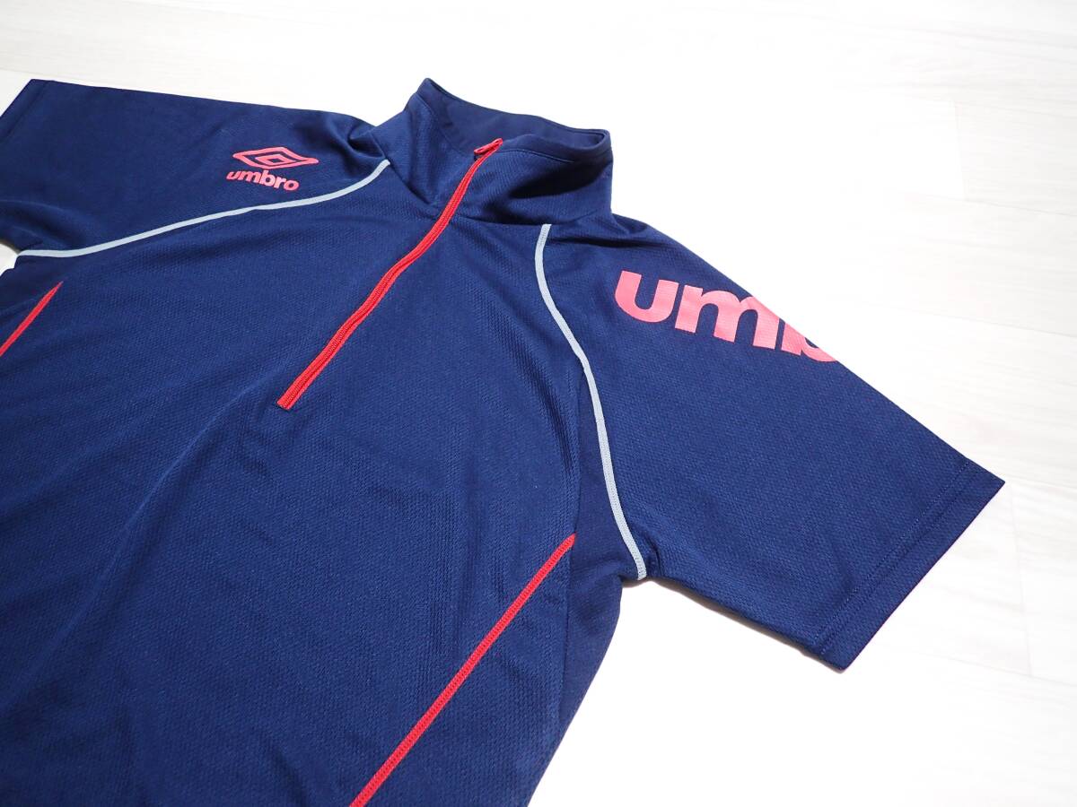 ☆umbro　☆アンブロ　☆サッカー　☆スポーツ　☆ハーフジップ　☆YKKファスナー　☆ラグラン袖　☆モックネック半袖　☆ネイビー　☆M_画像1