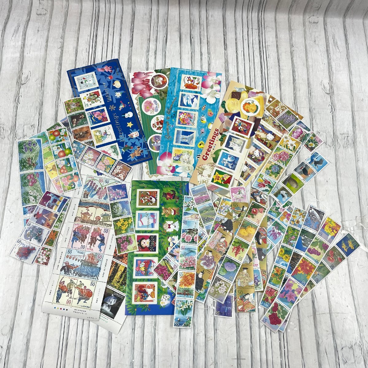 m002L 1 送料無料 未使用 バラ 切手 1万円分 額面10,000円分 まとめて 日本切手 郵便 記念切手_画像1