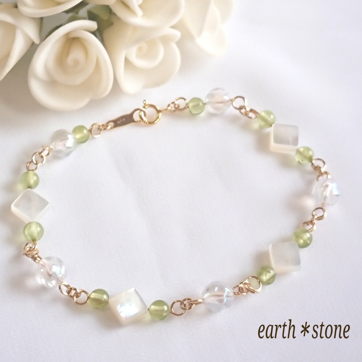 * hand made * natural stone *18KGP*8 month birthstone * peridot & white shell ( diamond )& aqua crystal (S line twist )... breath *