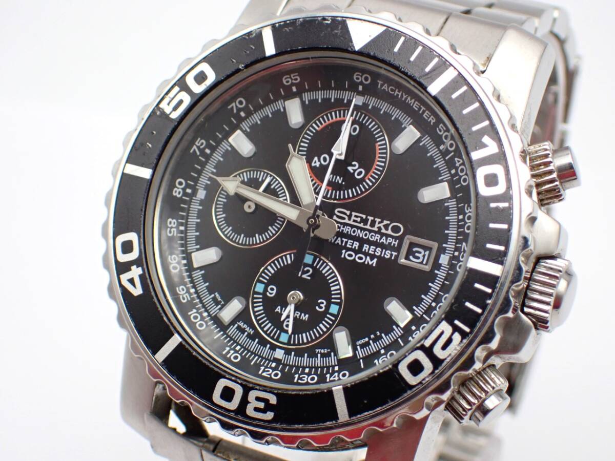 稼働品☆1円～☆SEIKO セイコー QZ メンズ腕時計 クロノグラフ 7T62-0CV0 デイト 黒文字盤 回転ベゼル シルバーカラー ラウンド/95382_画像1