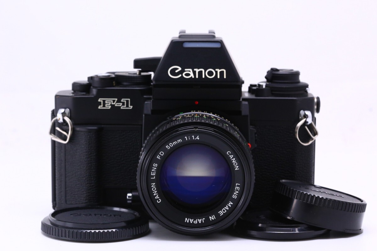 【極上美品】Canon New F-1 AEファインダー + New FD 50mm F1.4 MF一眼レフ フイルムカメラ #1244712454の画像1