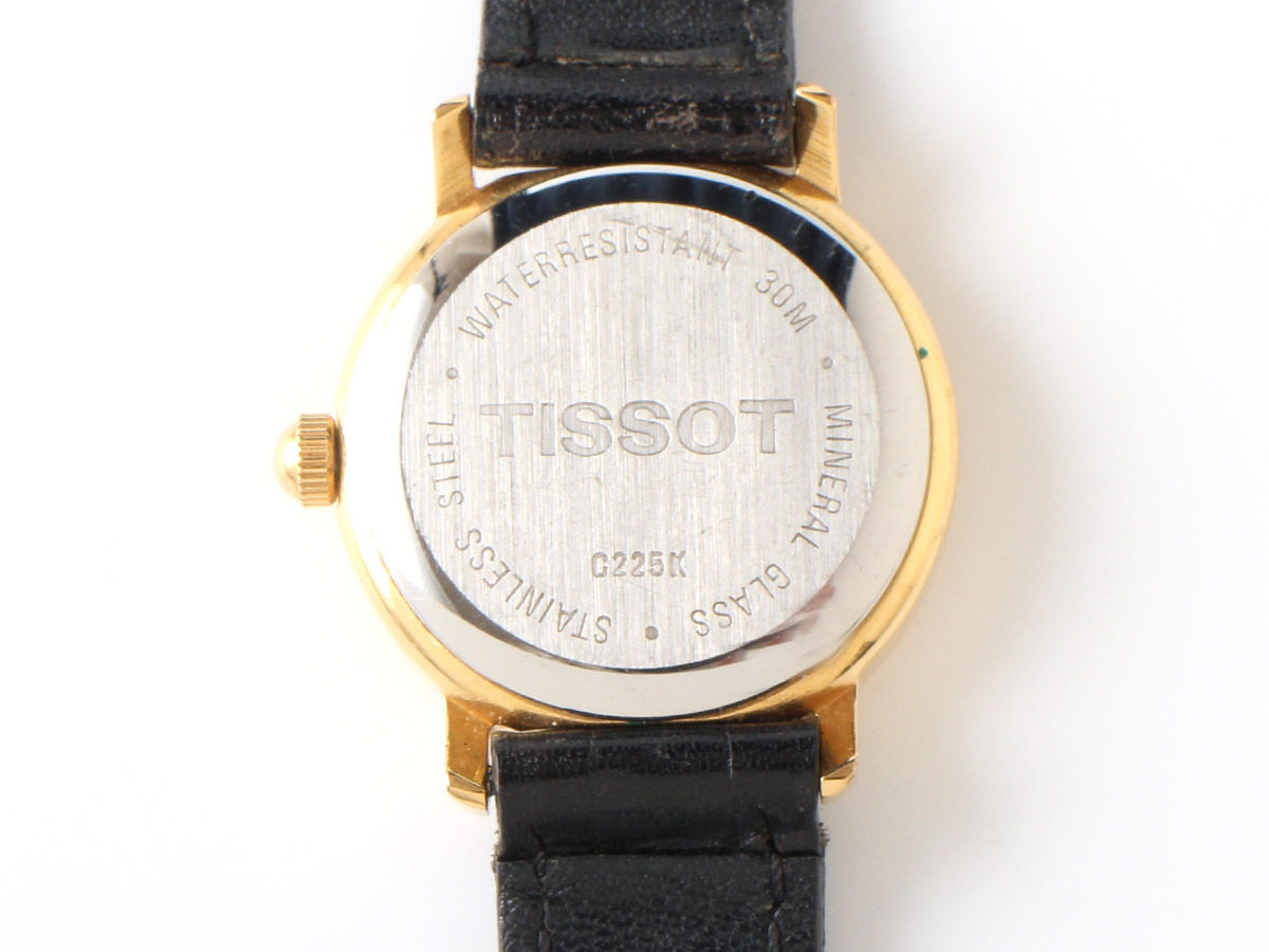 E17003 美品 TISSOT ティソ 腕時計 ゴールド×ブラック 黒 アナログ 2針 C225K レザーベルト 本革 SWISS MADE 動作未確認_画像4