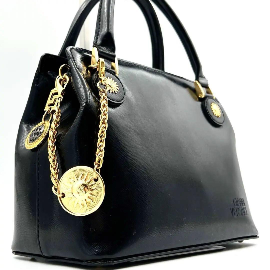 { beautiful goods }GIANNI VERSACE Gianni Versace sun Burst charm safia-no leather handbag sun god black handbag 
