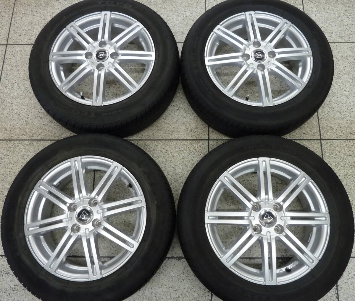 ●●2404-Nn24LL マナレイ ツインスポーク 5.5J 15in +42 PCD100 175/65R15 4本 バリ山 美品！ アクア ヴィッツ キューブ スイフト ポルテの画像1