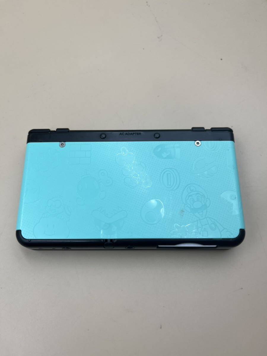 【通電動作確認済み】 Nintend 任天堂 new ニンテンドー 3DS 本体 KTR-001 ブラック 充電器 モンスターハンターカセット 付 の画像3