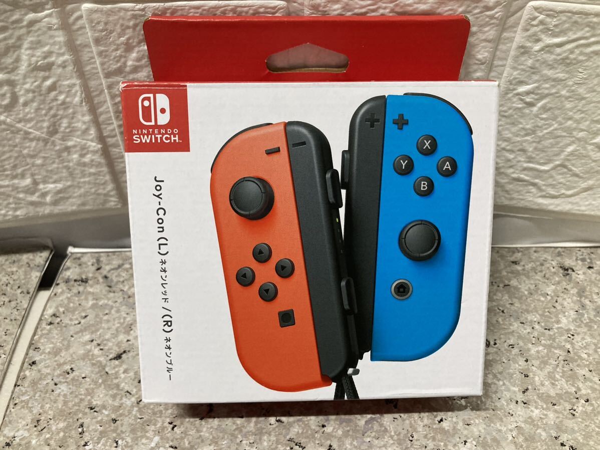 AZ-267.【任天堂純正品】Joy-Con (L) ネオンレッド/ (R) ネオンブルー ジョイコン_画像1