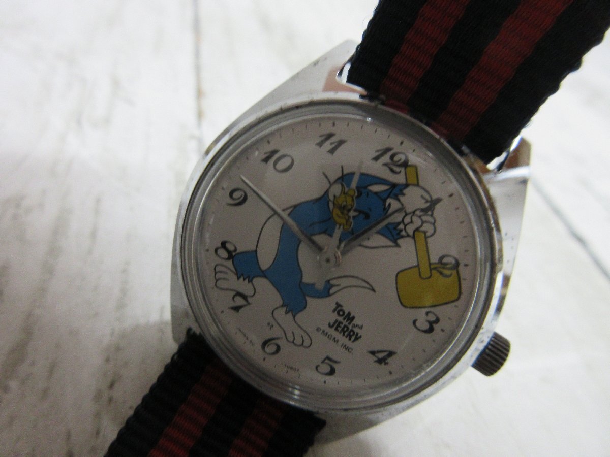 a4 １円 稼働品 腕時計 Tom and JERRY トムとジェリー 5000-7000 手巻き 機械式 【星見】の画像1