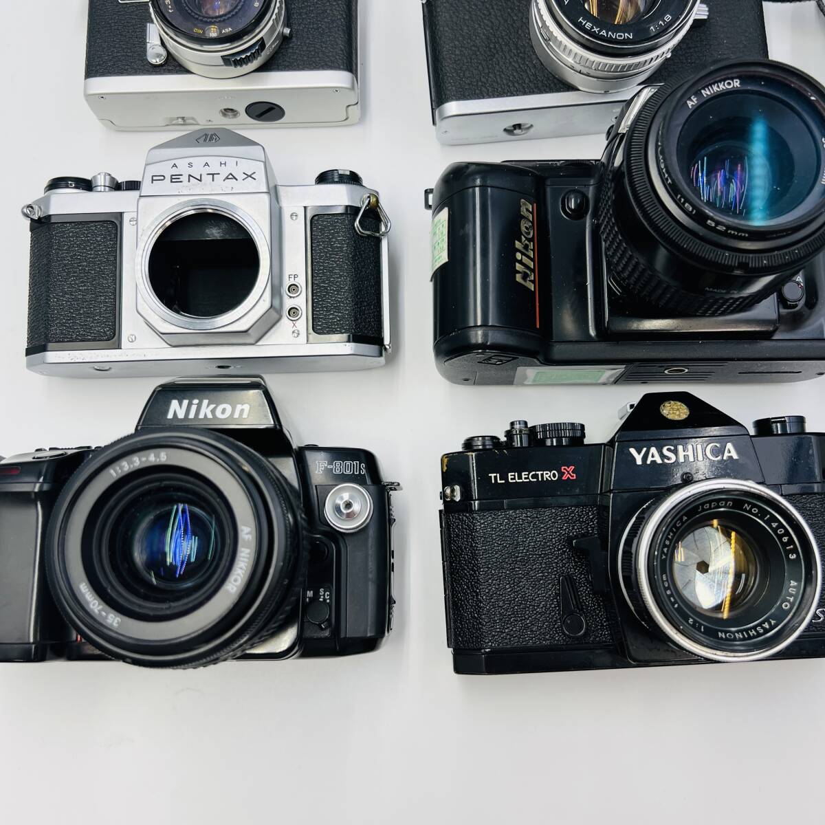 【33-246】カメラ フィルムカメラ 大量 まとめ売り Nikon PENTAX KONICA OLYMPUS YASHICA Canon ジャンク スピードライト 三脚 FUJICAの画像2