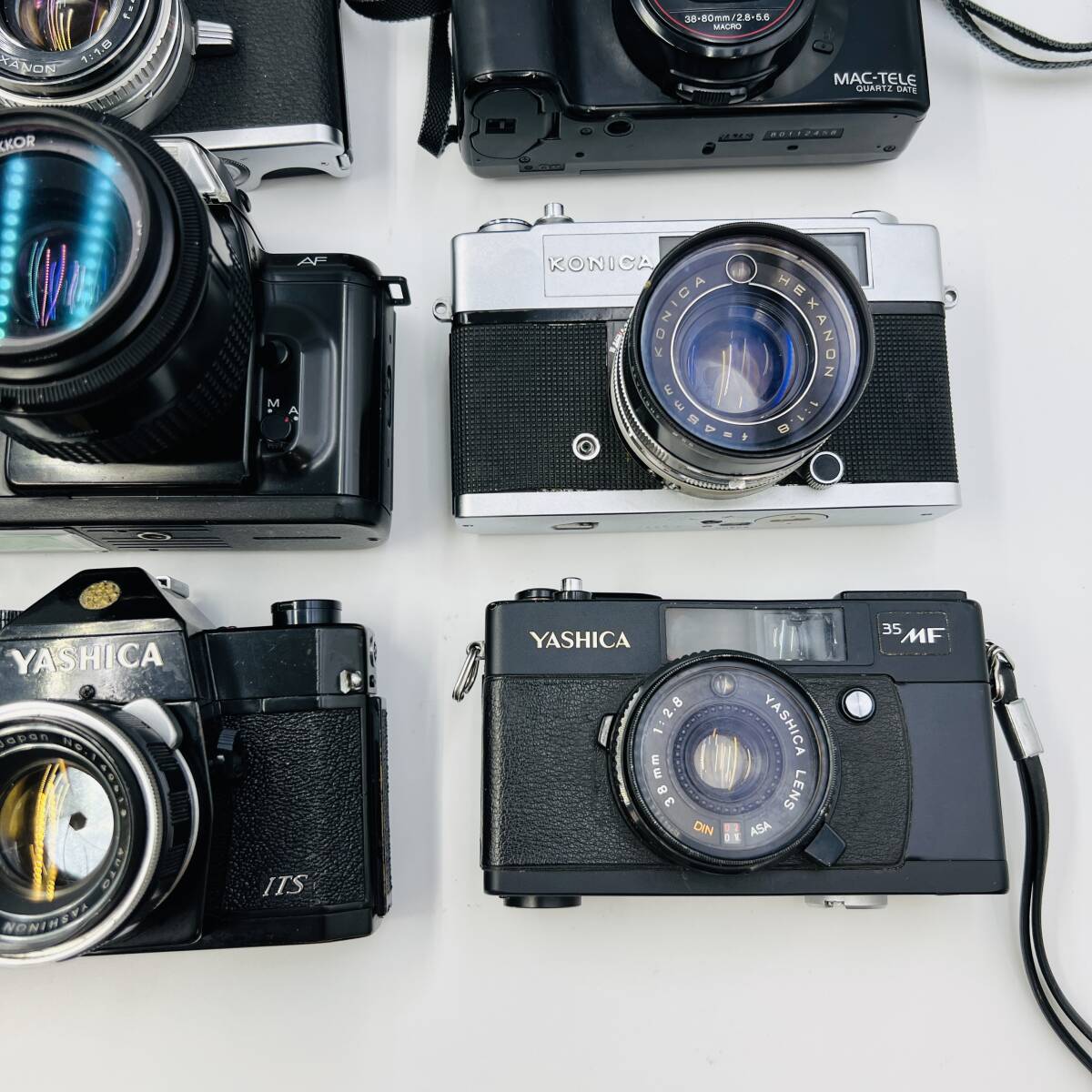 【33-246】カメラ フィルムカメラ 大量 まとめ売り Nikon PENTAX KONICA OLYMPUS YASHICA Canon ジャンク スピードライト 三脚 FUJICAの画像5