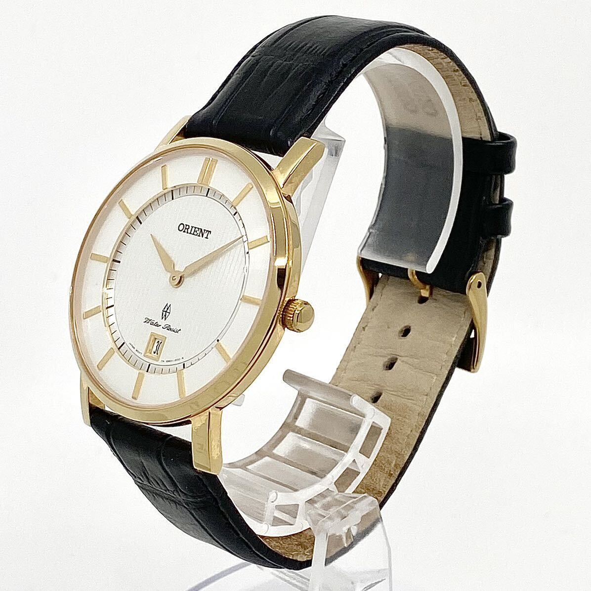 ORIENT 腕時計 デイト サファイアクリスタル ラウンド バーインデックス 2針 クォーツ quartz ゴールド 金 オリエント Y691の画像3