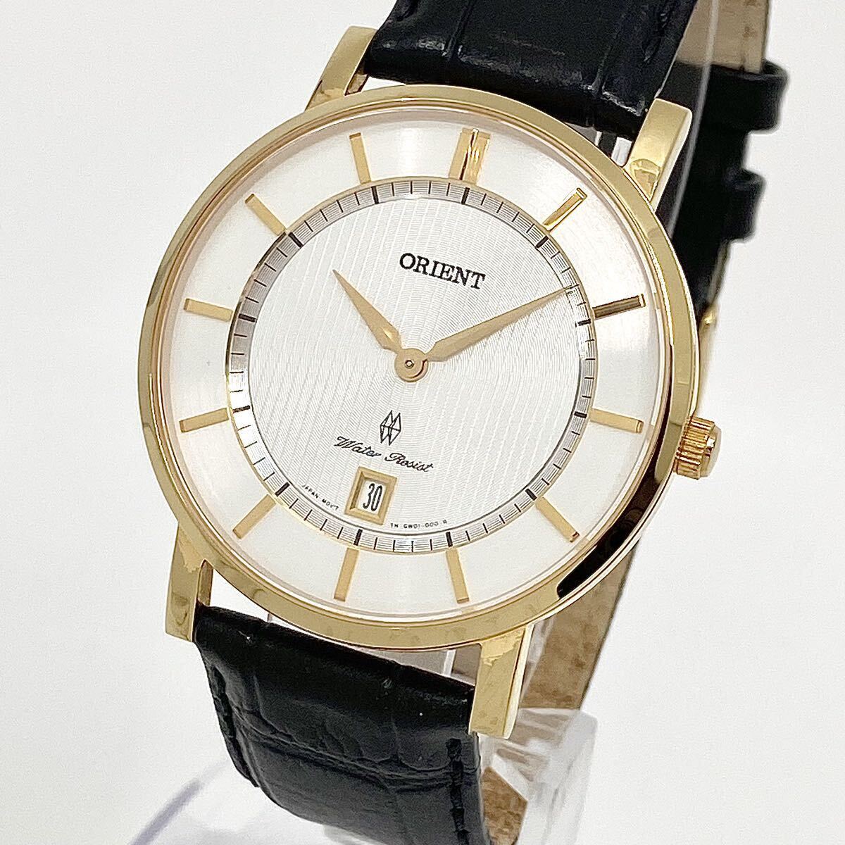 ORIENT 腕時計 デイト サファイアクリスタル ラウンド バーインデックス 2針 クォーツ quartz ゴールド 金 オリエント Y691の画像1