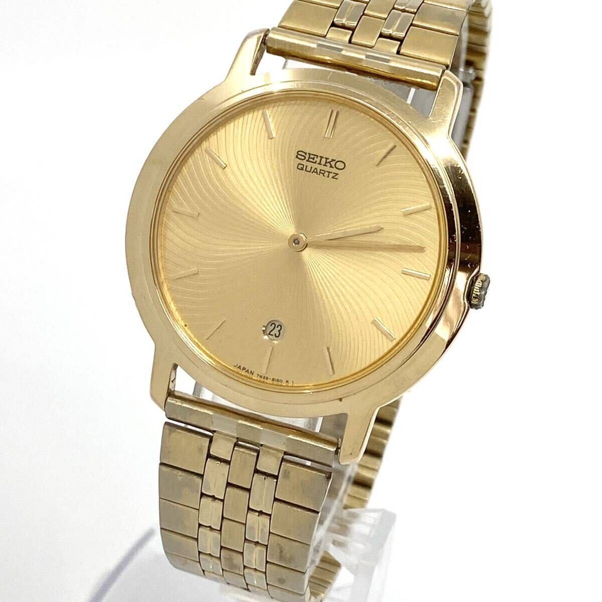 SEIKO 腕時計 デイト 7N29-8080 ラウンド バーインデックス 2針 クォーツ quartz ゴールド 金 セイコー Y805