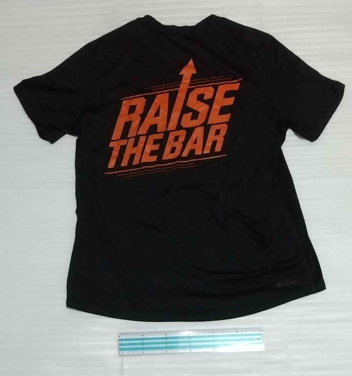 ☆adidas.com 半袖TシャツLサイズ アディダス スポーツ ウェア ティー オレンジ白ホワイト黒色ブラックFOOTBALL RAISE THE BAR CREATOR TEE_背面です。