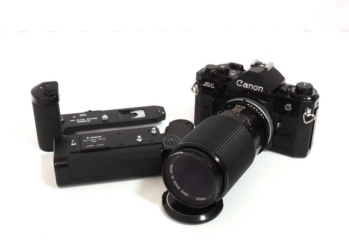 □　Canon　A-1　キャノン　ブラックボディ　一眼レフ　フィルムカメラ　CANON MACRO LENS FD 100㎜ 1:4 S.C.　動作未確認　中古品　④_画像1