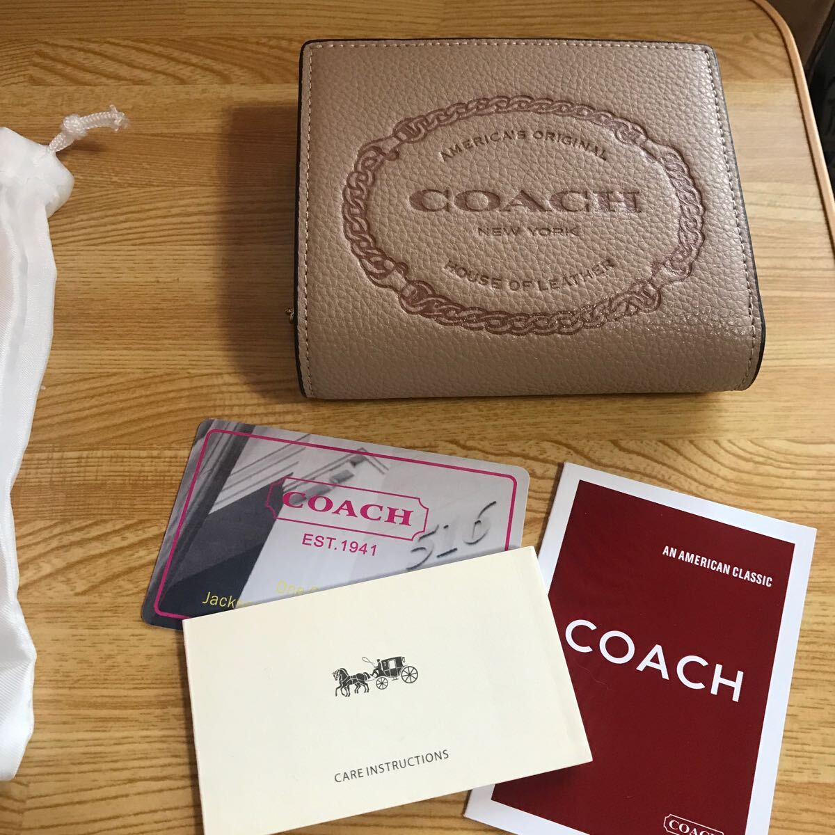 新品未使用COACH 二つ折り財布の画像10