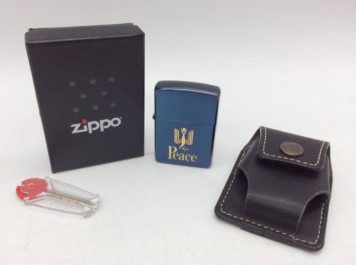 #3524 ZIPPO ジッポー PEACE 限定 非売品 ライター イニシャル入り オイルライター ブルーチタン レザーケース付き フリント付き 火花の画像1