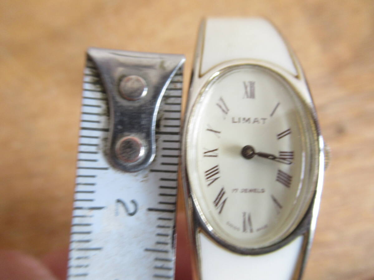 LIMAT Switzerland made hand winding type bangle watch 17 stone length oval white face Vintage goods machine wristwatch 