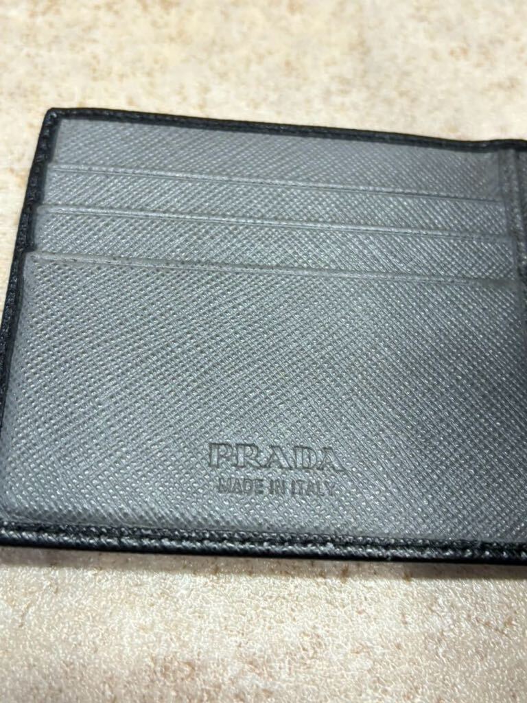 T014 【PRADA プラダ 】 マネークリップ 財布 二つ折り財布 レザー ブラック 黒 中古_画像6