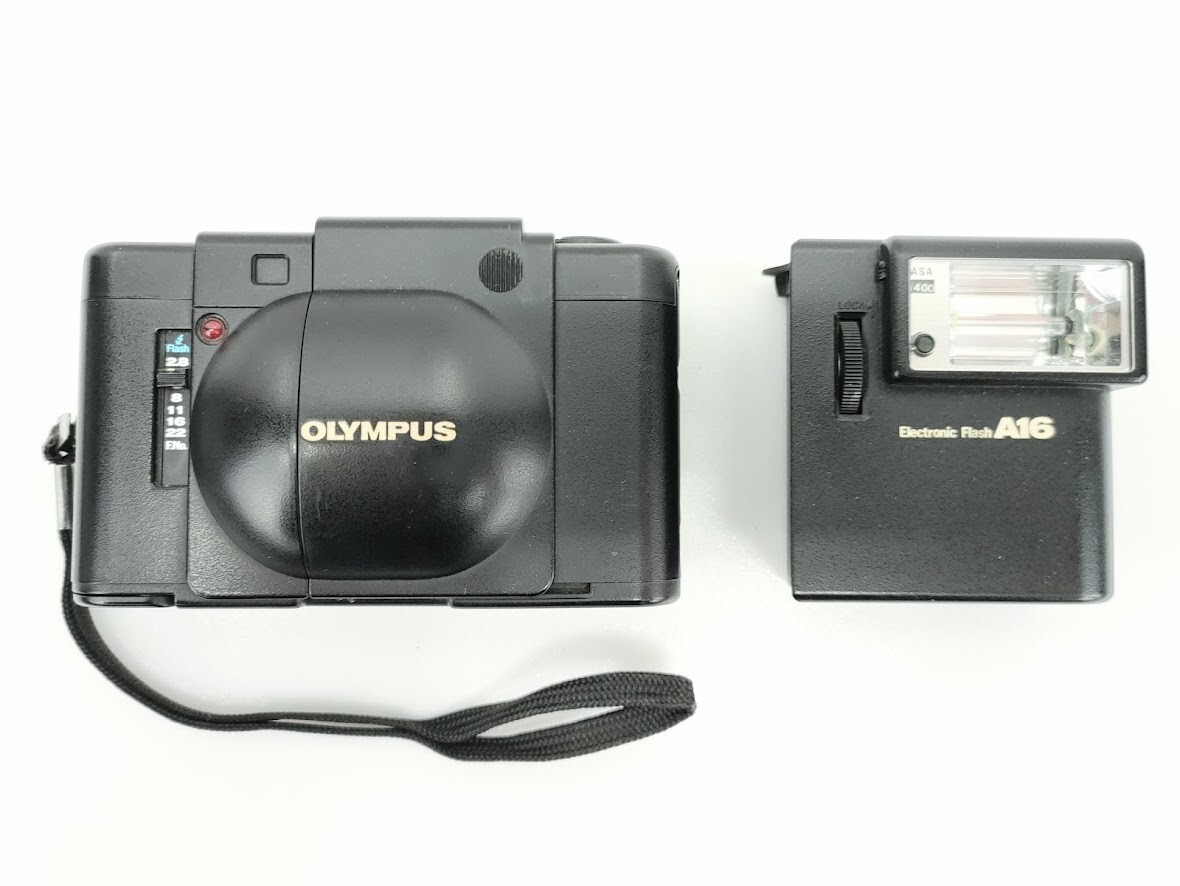 6 オリンパス XA ボディ コンパクト フィルム カメラ F ZUIKO f 35mm レンズ A16 フラッシュ ストロボ ケース付 ジャンク OLYMPUS◆レトロの画像2
