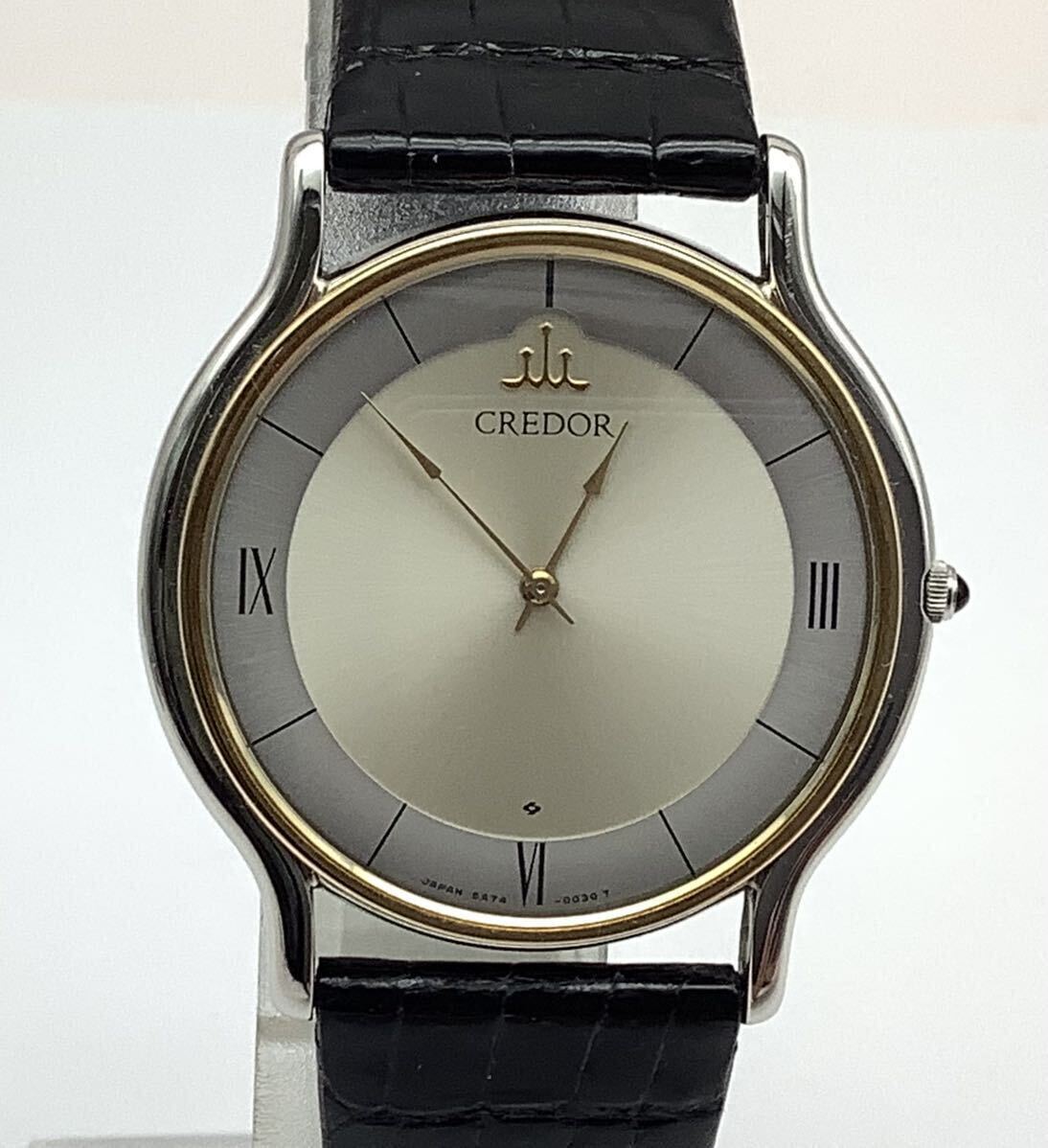 59 ジャンク 不動品 SEIKO セイコー 5A74-0020 CREDOR クレドール 18K BEZEL ベゼル クォーツ メンズ腕時計 ケース付 取説付の画像2