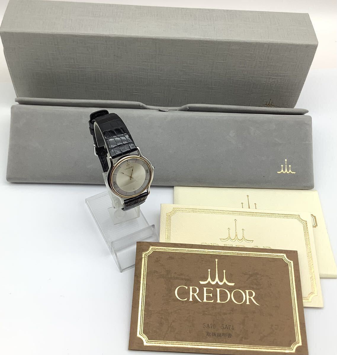 59 ジャンク 不動品 SEIKO セイコー 5A74-0020 CREDOR クレドール 18K BEZEL ベゼル クォーツ メンズ腕時計 ケース付 取説付の画像1