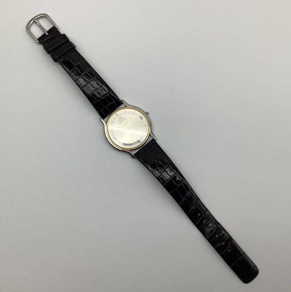 59 ジャンク 不動品 SEIKO セイコー 5A74-0020 CREDOR クレドール 18K BEZEL ベゼル クォーツ メンズ腕時計 ケース付 取説付の画像5