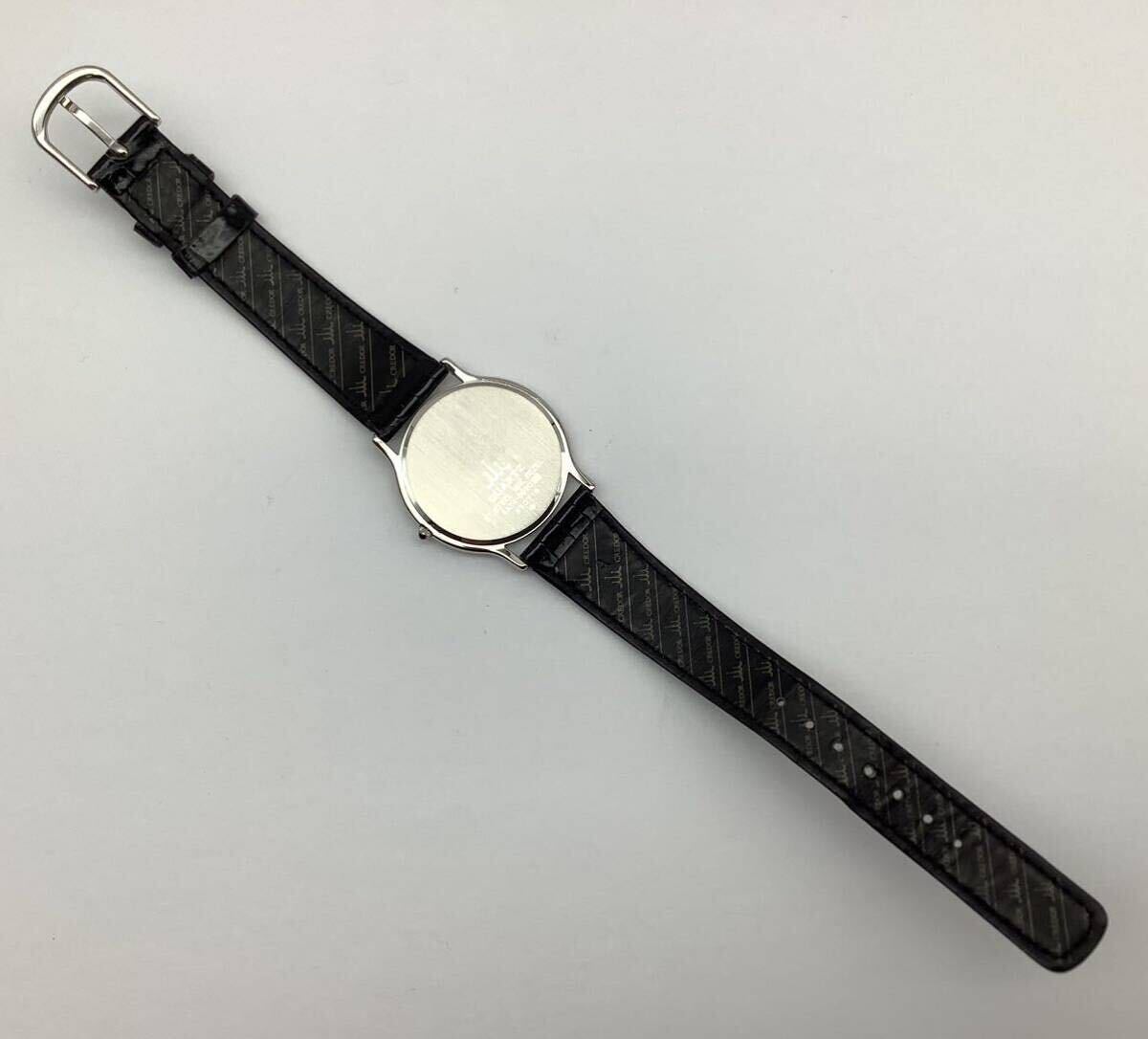 59 ジャンク 不動品 SEIKO セイコー 5A74-0020 CREDOR クレドール 18K BEZEL ベゼル クォーツ メンズ腕時計 ケース付 取説付の画像6