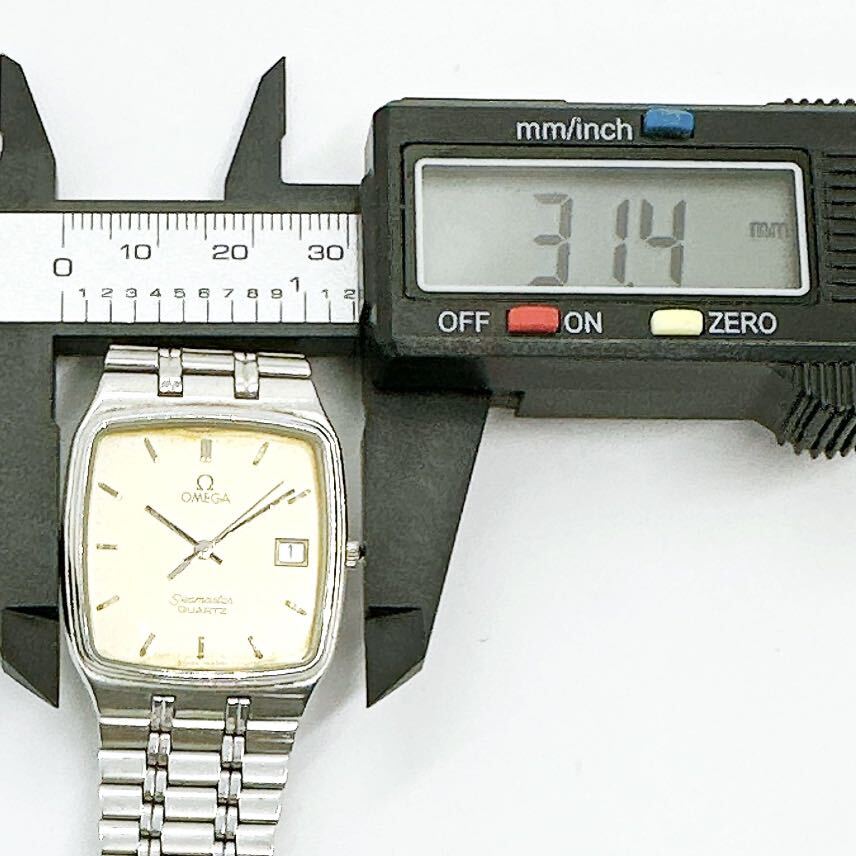 04041 オメガ OMEGA ST 396.0937 シーマスター デイト メンズ 腕時計 クォーツ 電池式 QZ シルバーカラー 保証書 コマ_画像9