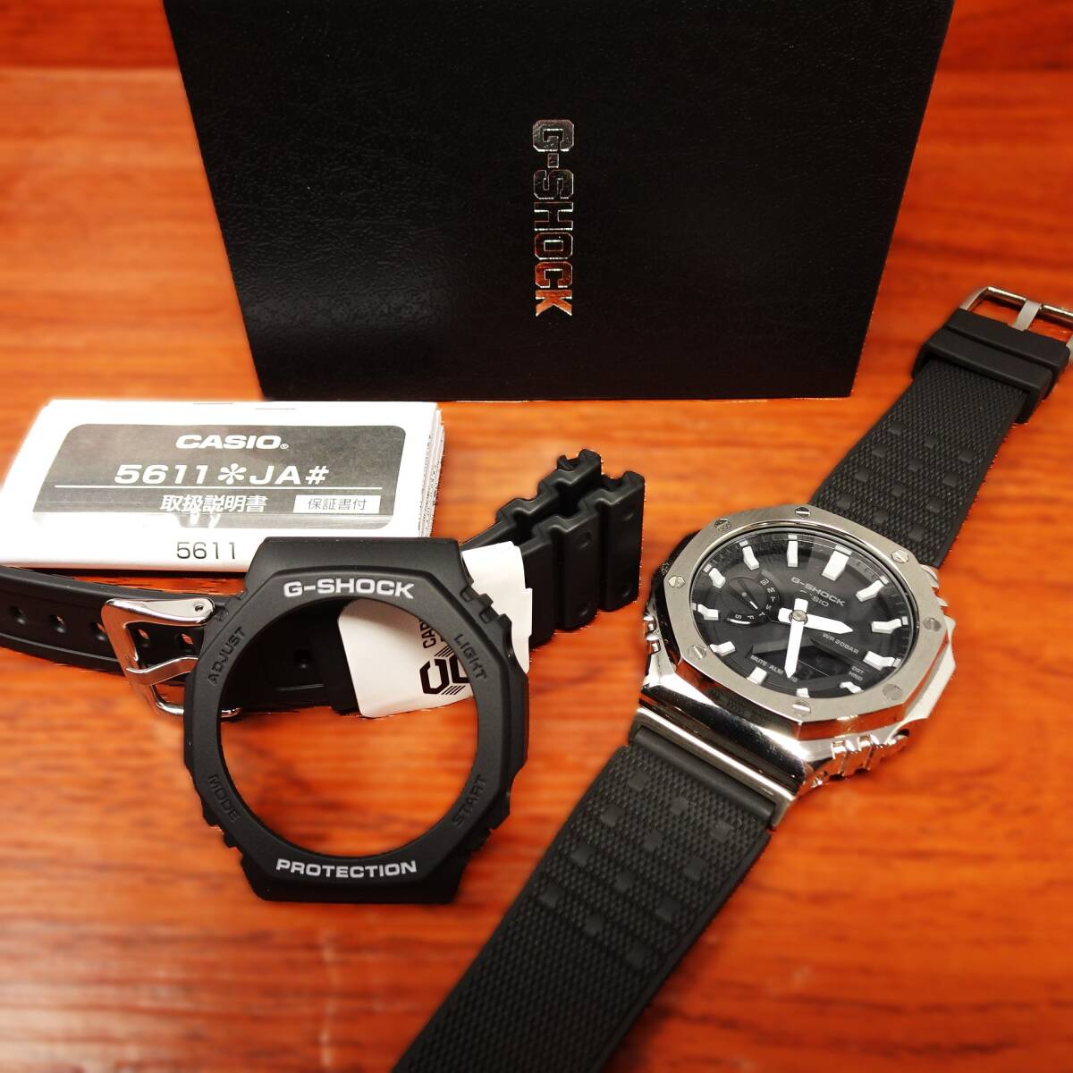 送料無料・新品・Gショックカスタム腕時計本体付きGA2100海外ステンレス製シルバーベゼルシリコンラバーベルトモデルメンズ・カシオーク