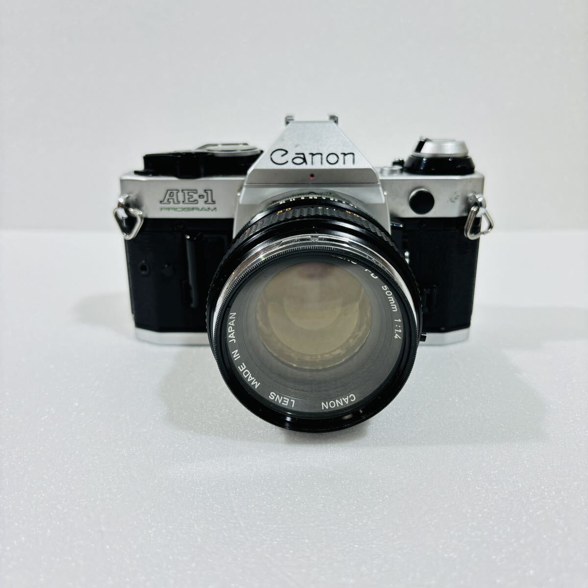（11）Canon キャノン AE-1PROGRAM FD50ｍｍ 1:1.4 レンズ付き カメラ フィルム 動作未確認の画像1