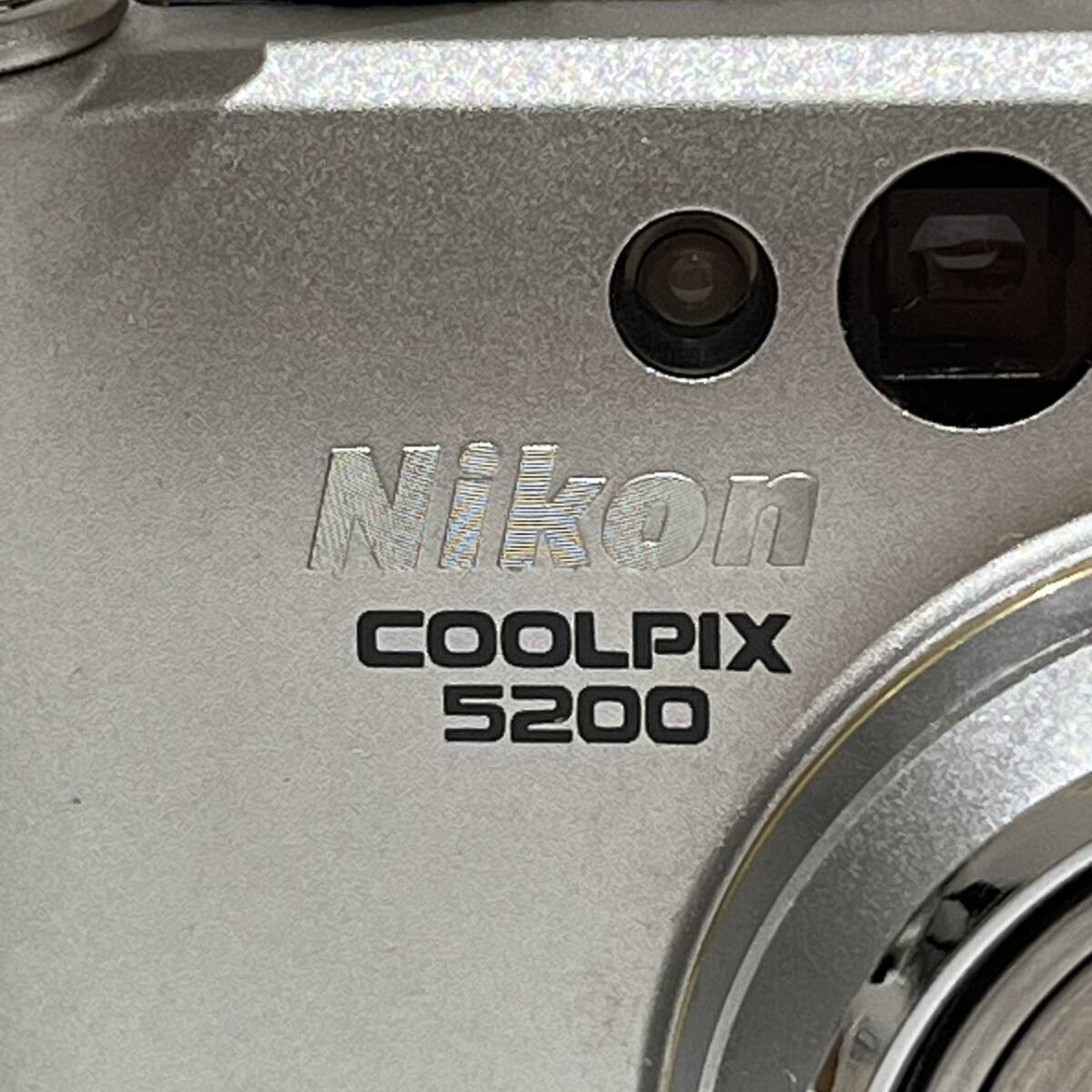 【AMT-10686】Nikon COOLPIX5200 ニコン クールピクス ZOOM NIKKOR ED 7,8-23.4mm 1:2.9-4.9 シルバー デジカメ 電化製品 ジャンク品の画像4