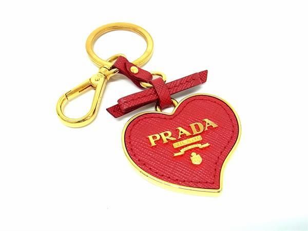 1円 ■美品■ PRADA プラダ サフィアーノレザー リボン ハート キーホルダー キーリング バッグチャーム ゴールド系×レッド系 AW6547の画像1