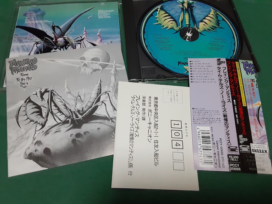 PRAYING MANTIS　プレイング・マンティス◆『タイム・テルズ・ノー・ライズ(戦慄のマンティス)』日本盤CDユーズド品_画像2