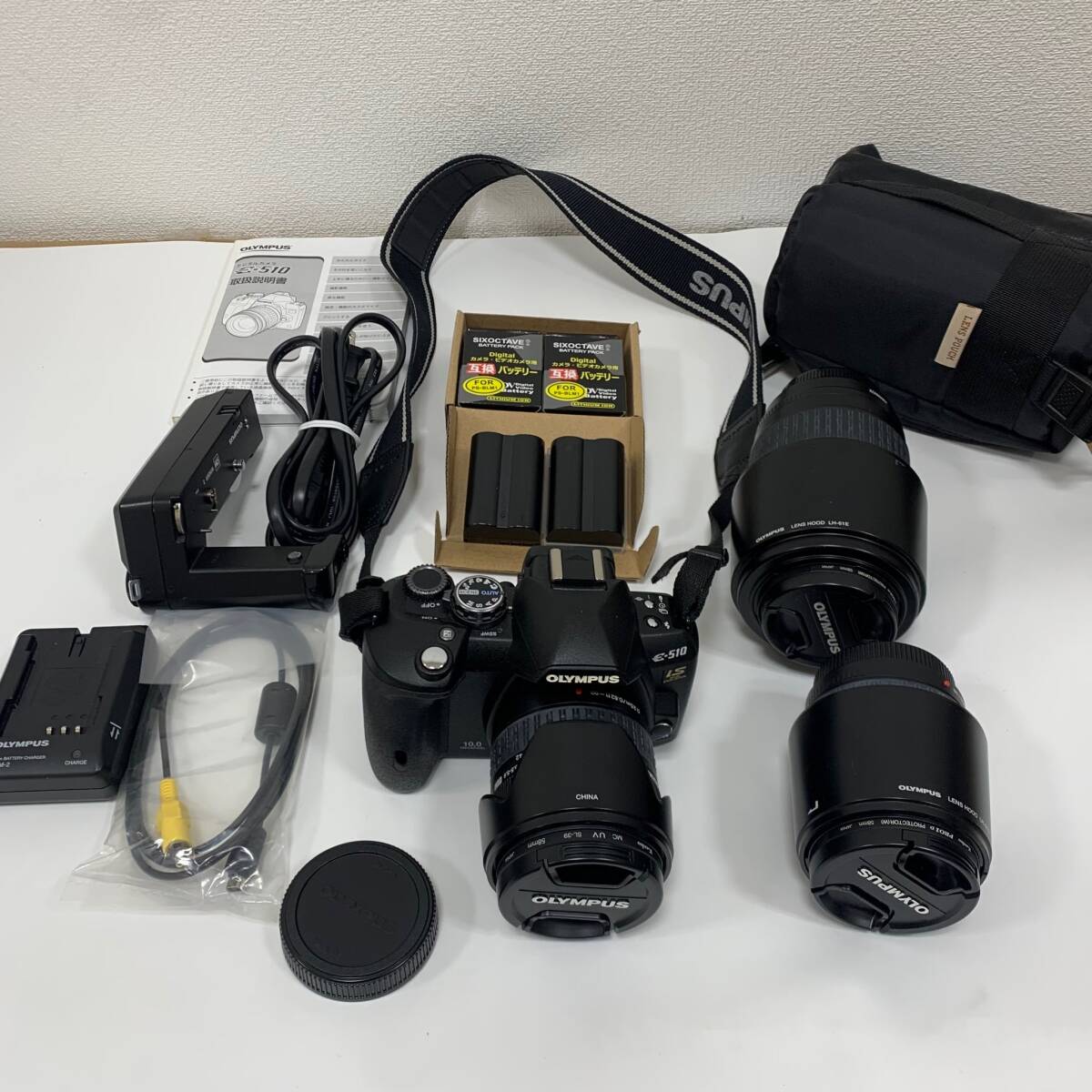 #11048 OLYMPUS E-510 オリンパス デジカメ デジタルカメラ レンズ３種・予備バッテリー２本・説明書付属 動作未確認 箱なしの画像1