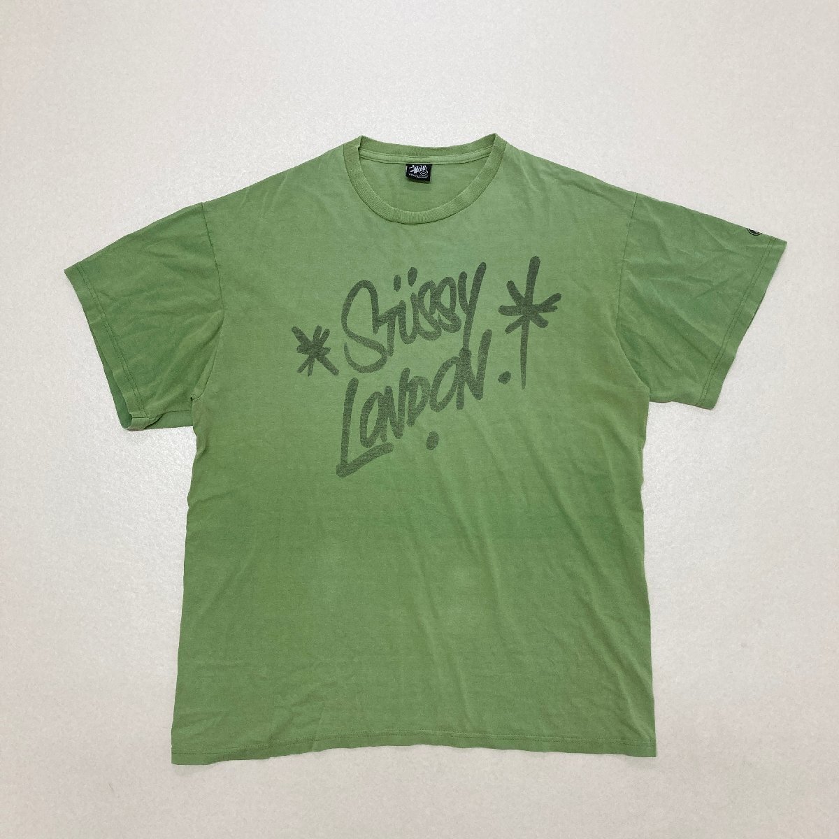 ●00s 初期 STUSSY ステューシー Tシャツ トップス 半袖 フロントデザイン プリント 斜タグ バイアスタグ グリーン系 メンズXL 0.25kg●の画像1