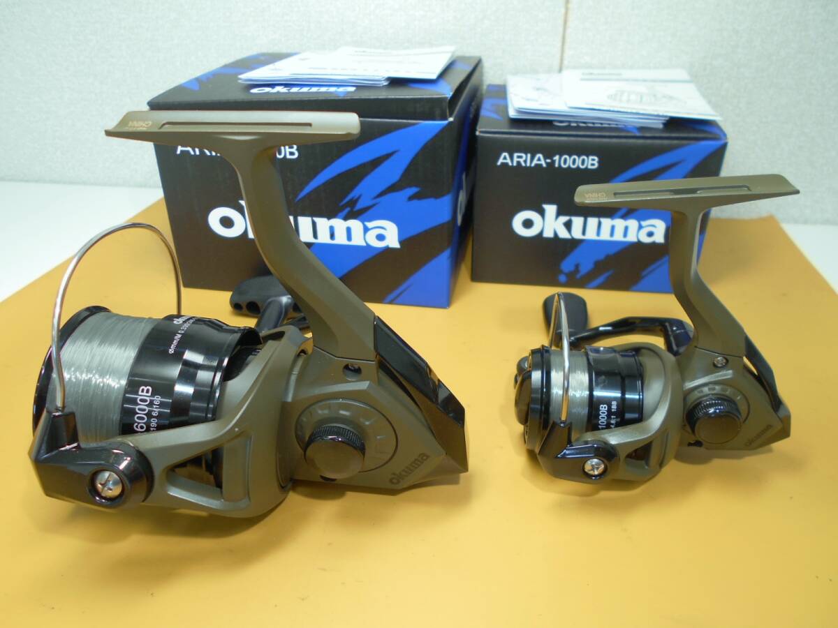 ●未使用・開封品●【OKUMA】 ARIA-6000B ・ ARIA-1000B　糸付き箱入り・2台セット_ナイロンライン付属のモデルです。