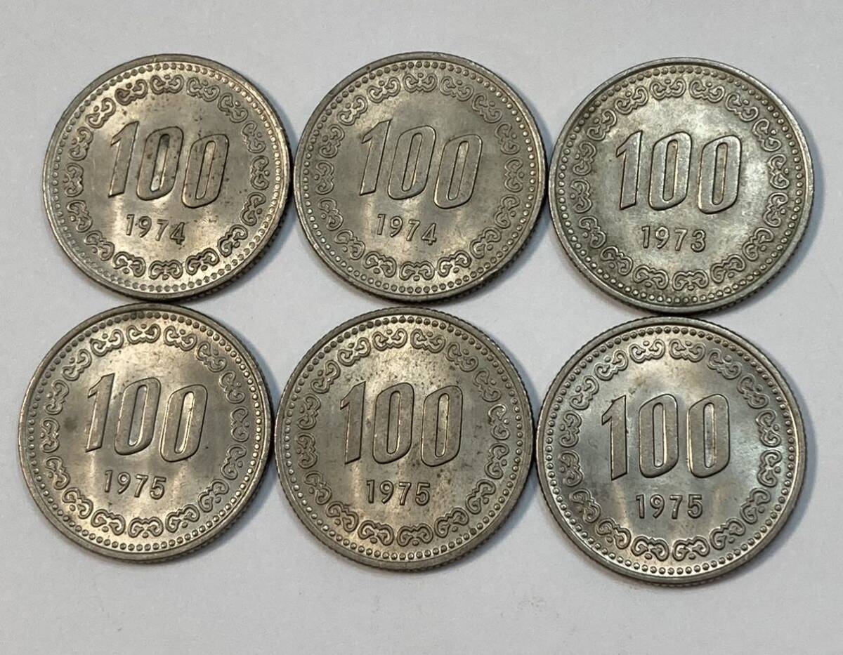 39 未使用 特年 韓国 100ウォン 硬貨 6枚 経年劣化の画像1