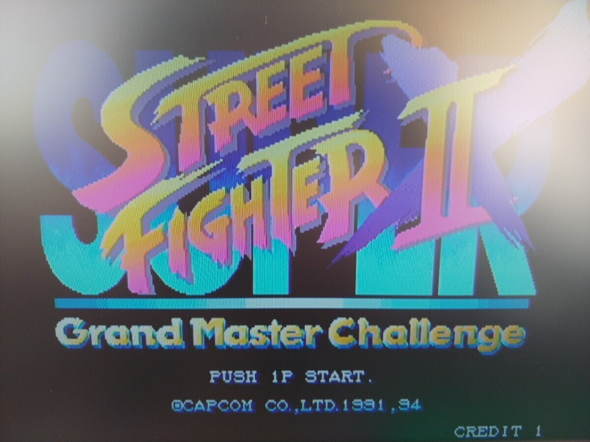 1円～ ROMのみ カプコン スーパーストリートファイター IIX 2X Grand Master Challenge CPSII CPS2 インスト帯取説シール 純正 封印アリの画像1