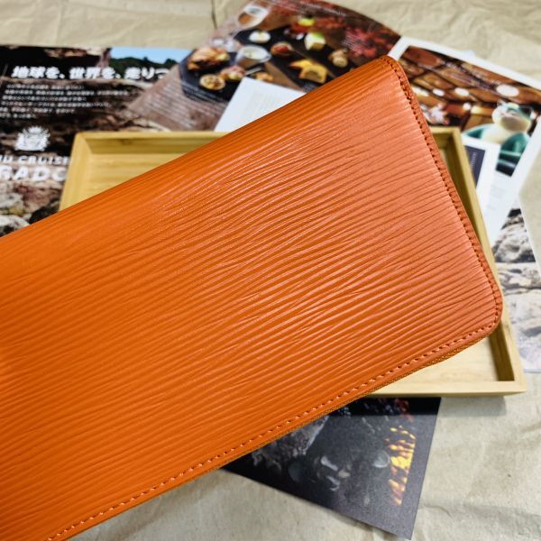 [ rice field middle leather .] new goods long wallet epi leather Zippy wallet round fastener leather purse men's purse man and woman use long wallet orange color 