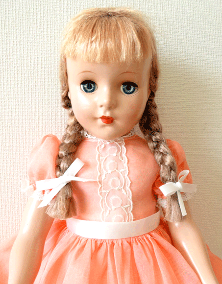  Vintage 1950 period America pretty hard plastic doll. girl three braided 