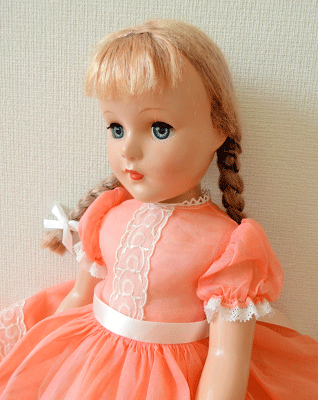  Vintage 1950 period America pretty hard plastic doll. girl three braided 