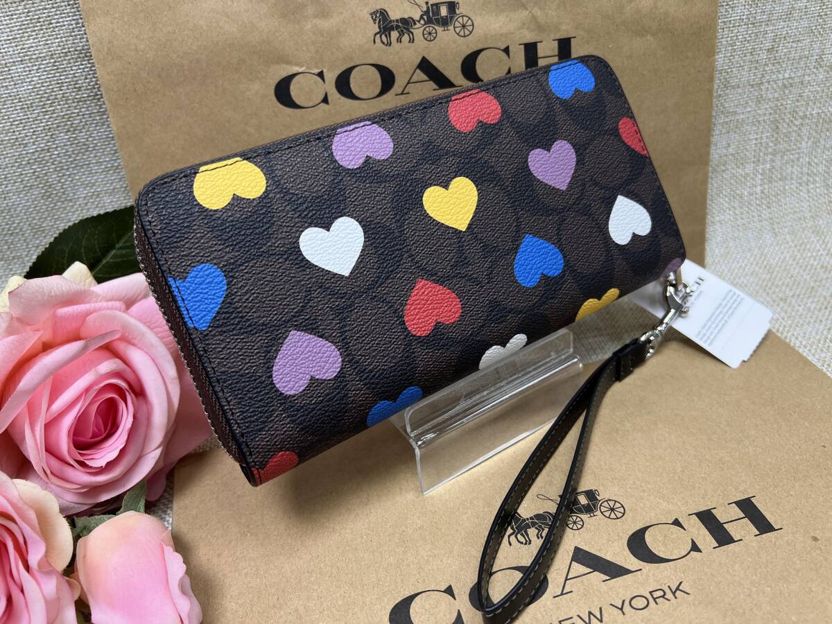 コーチ COACH 長財布 財布 ロング ジップ アラウンド ウォレット シグネチャー キャンバス ハート プリント プレゼント 贈り物 ギフトA341