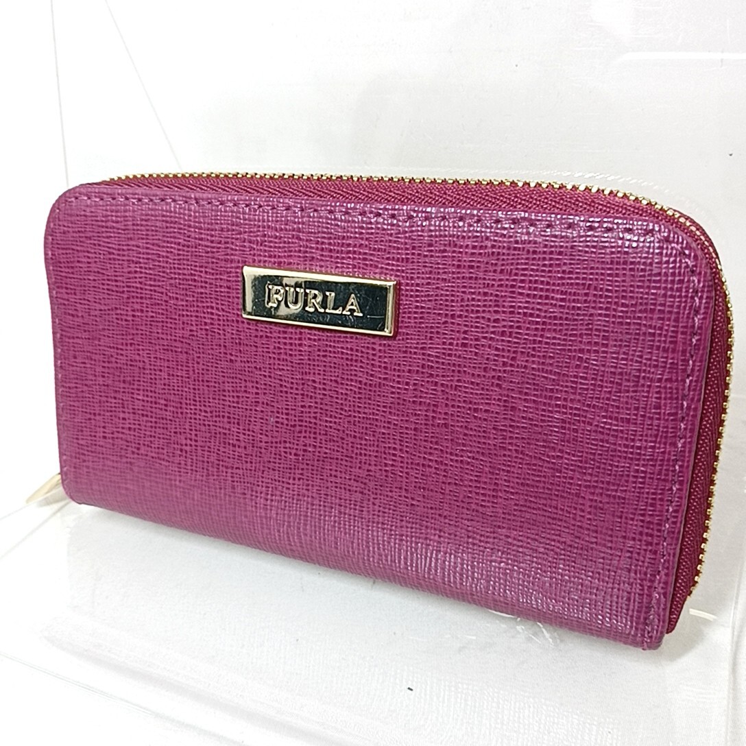 A Φ【商品ランク:B】 フルラ FURLA ロゴメタル 刻印 ゴールド金具 レザー 本革 ラウンドファスナー コインケース ウォレット 紫系の画像1