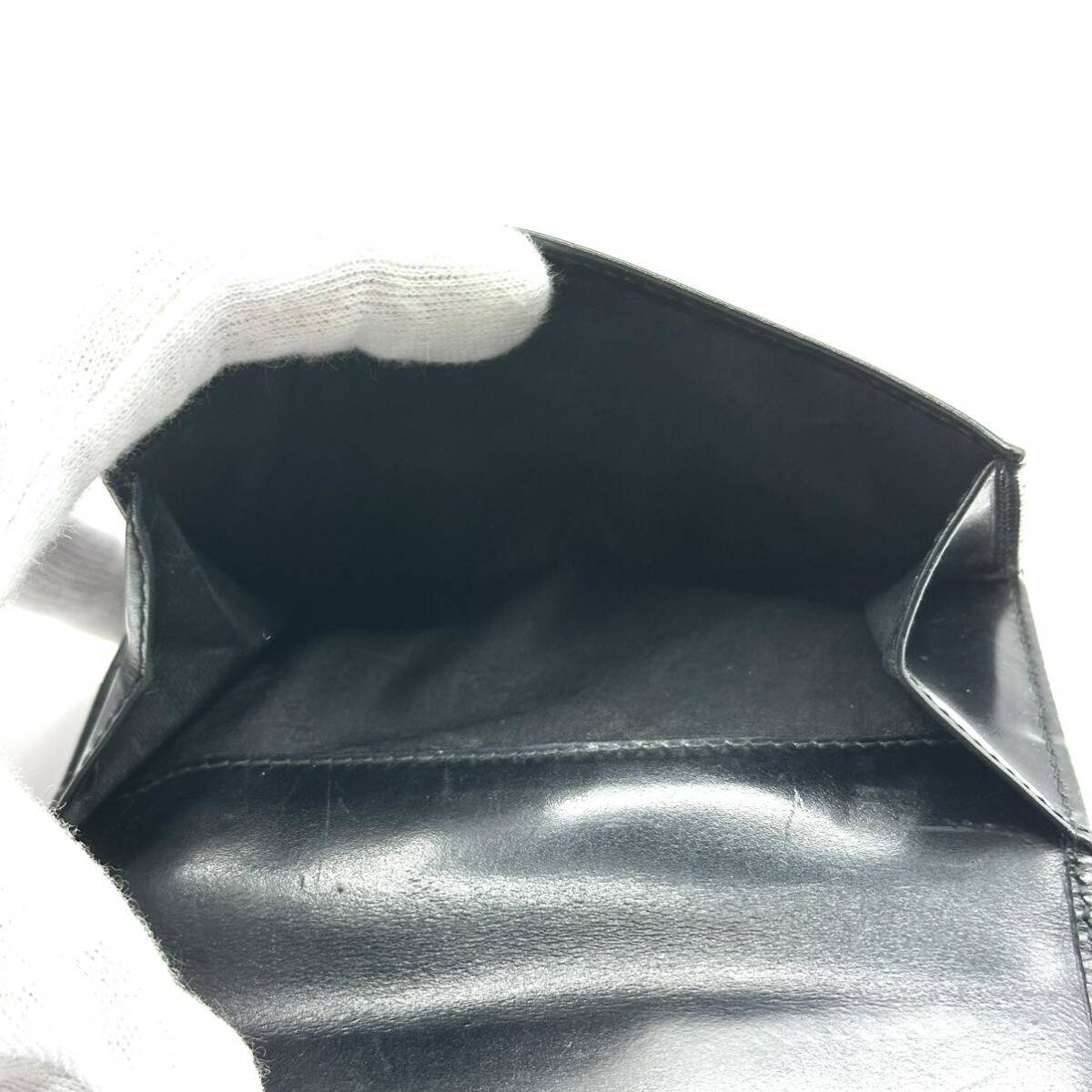 Salvatore Ferragamo ガンチーニ ブラック 二つ折り 財布 レザー レディース メンズ ユニセックス 黒 ブランド